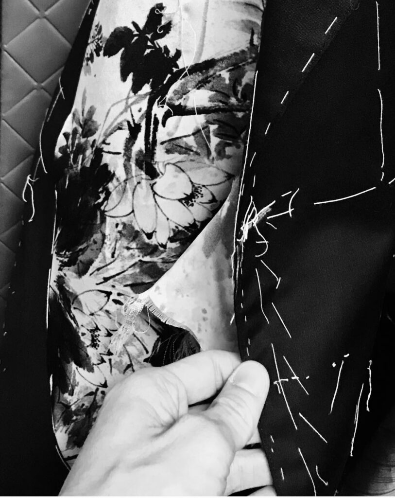 Tailor's work in progress on a jacket with silk lining
