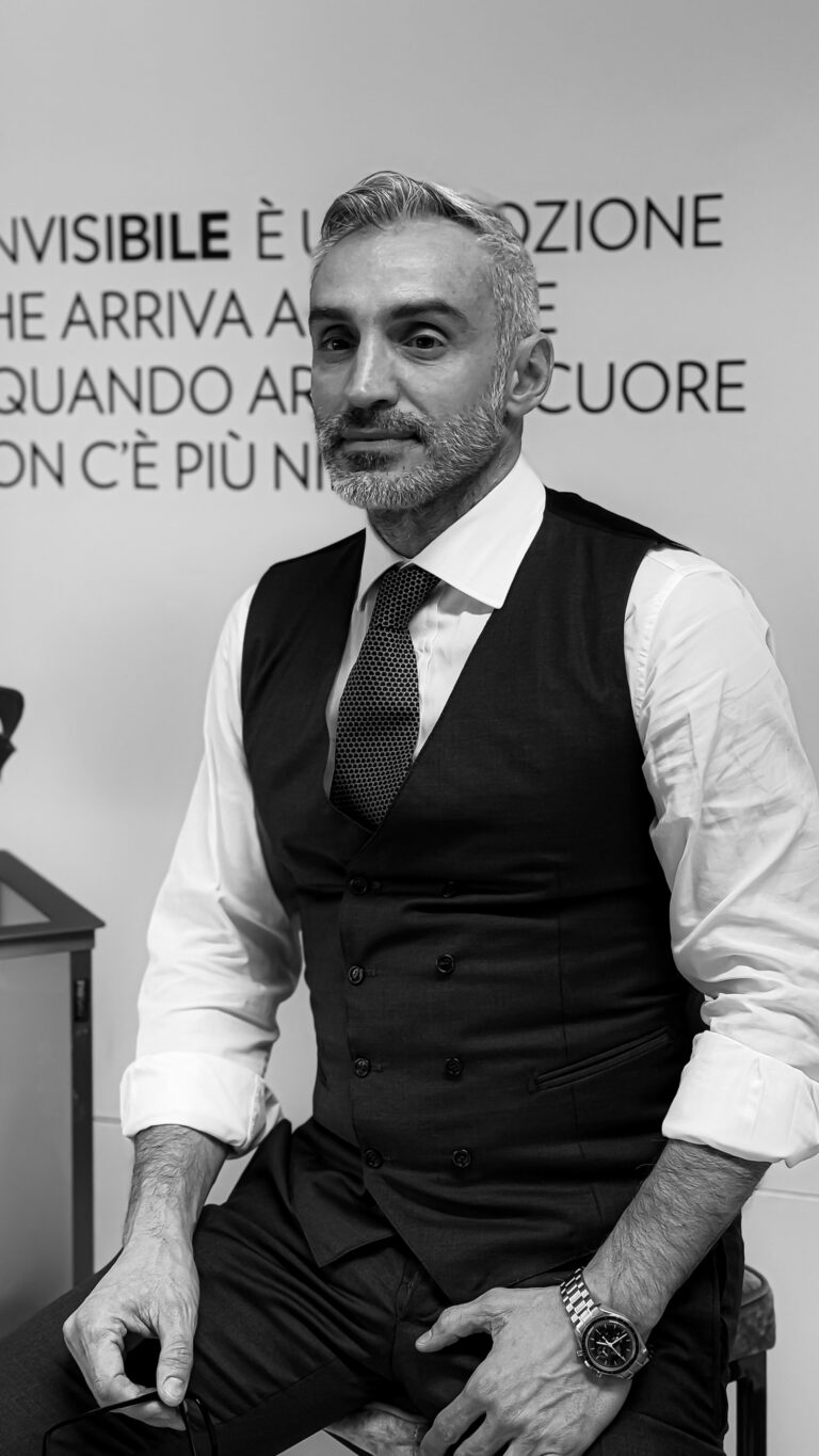Antonio Menegatti seated at a LINVISIBILE event